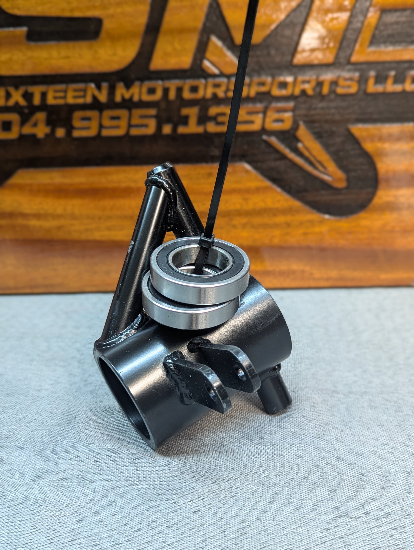 BANDOLERO LEFT REAR SUSP CARRIER ASSY w/brg