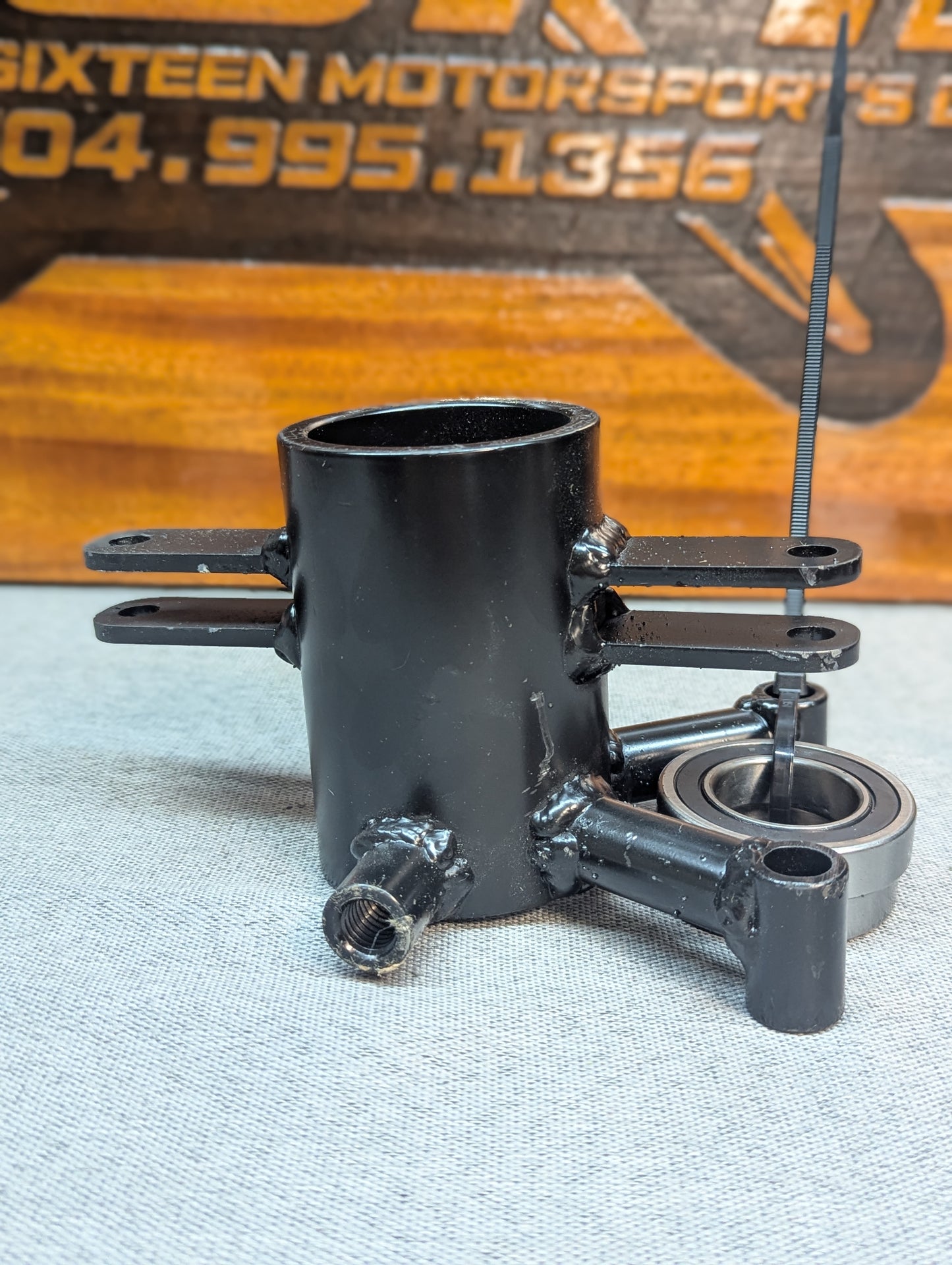 BANDOLERO RIGHT REAR SUSP CARRIER ASSY w/brg