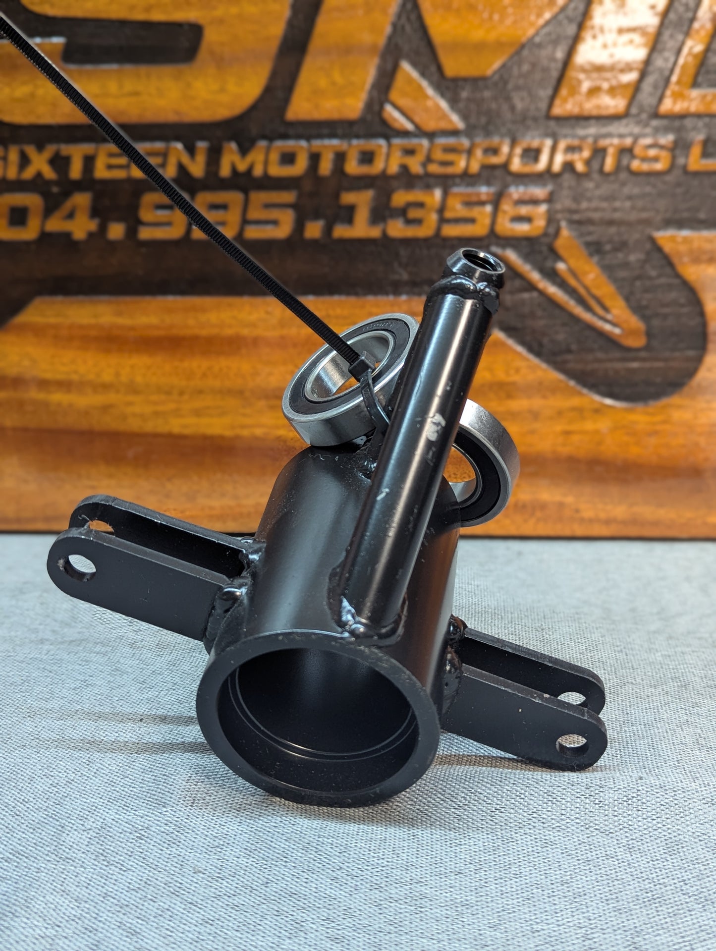 BANDOLERO LEFT REAR SUSP CARRIER ASSY w/brg